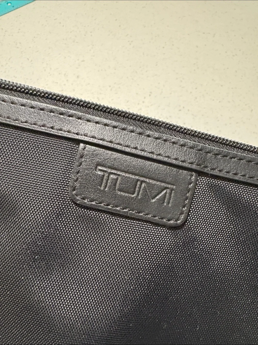 Tumi sleek black